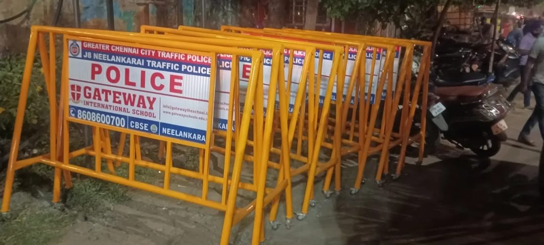 Traffic barricade branding for Gateway International School